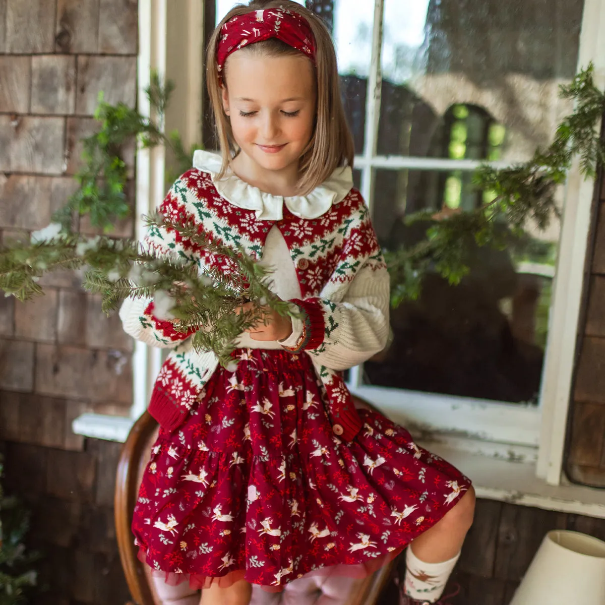Jupe courte rouge avec motifs de rennes en viscose, enfant || Red short skirt with reindeer all over print in viscose, child
