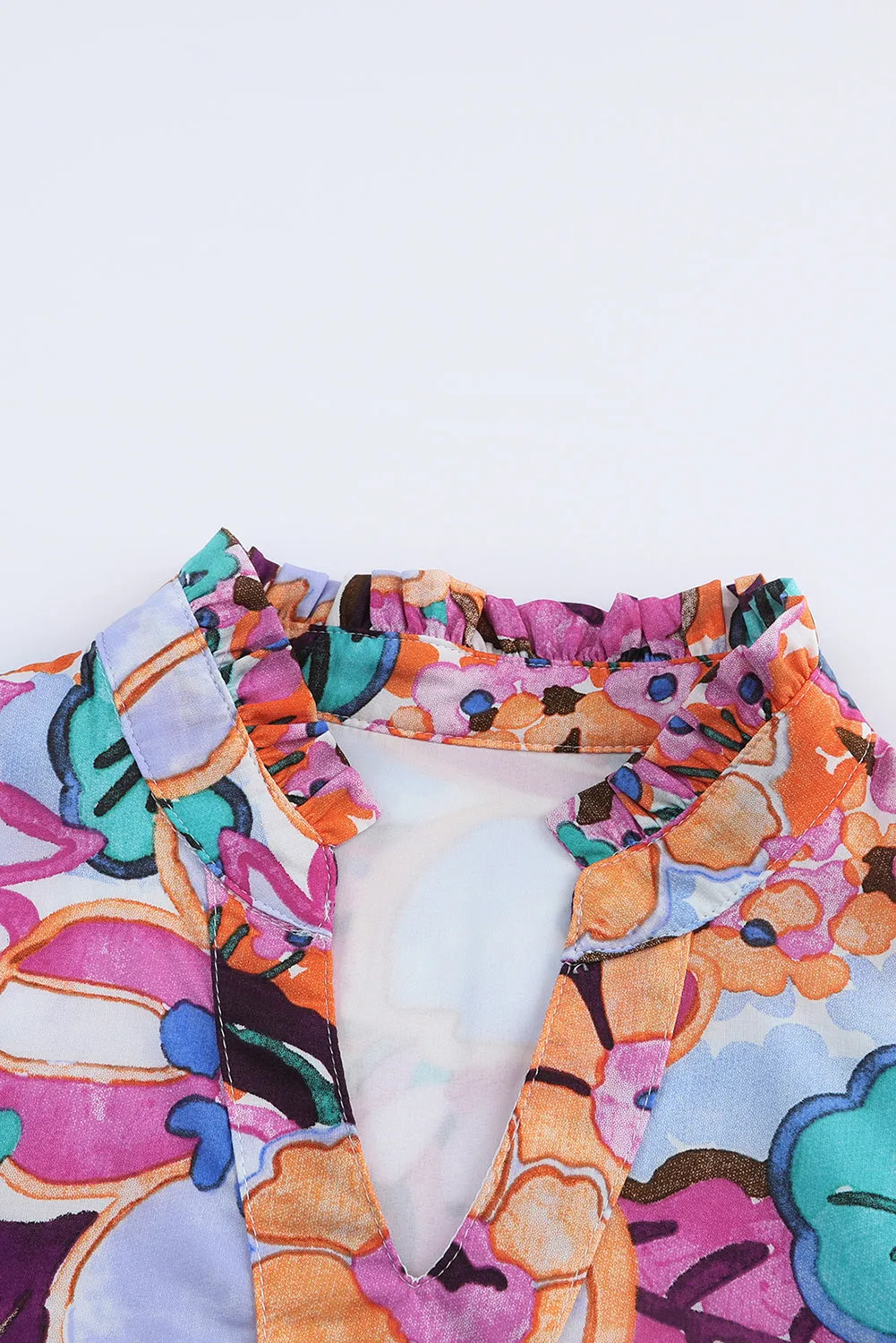 Multicolor Floral Print Flutter Sleeves Smocked Neck Blouse