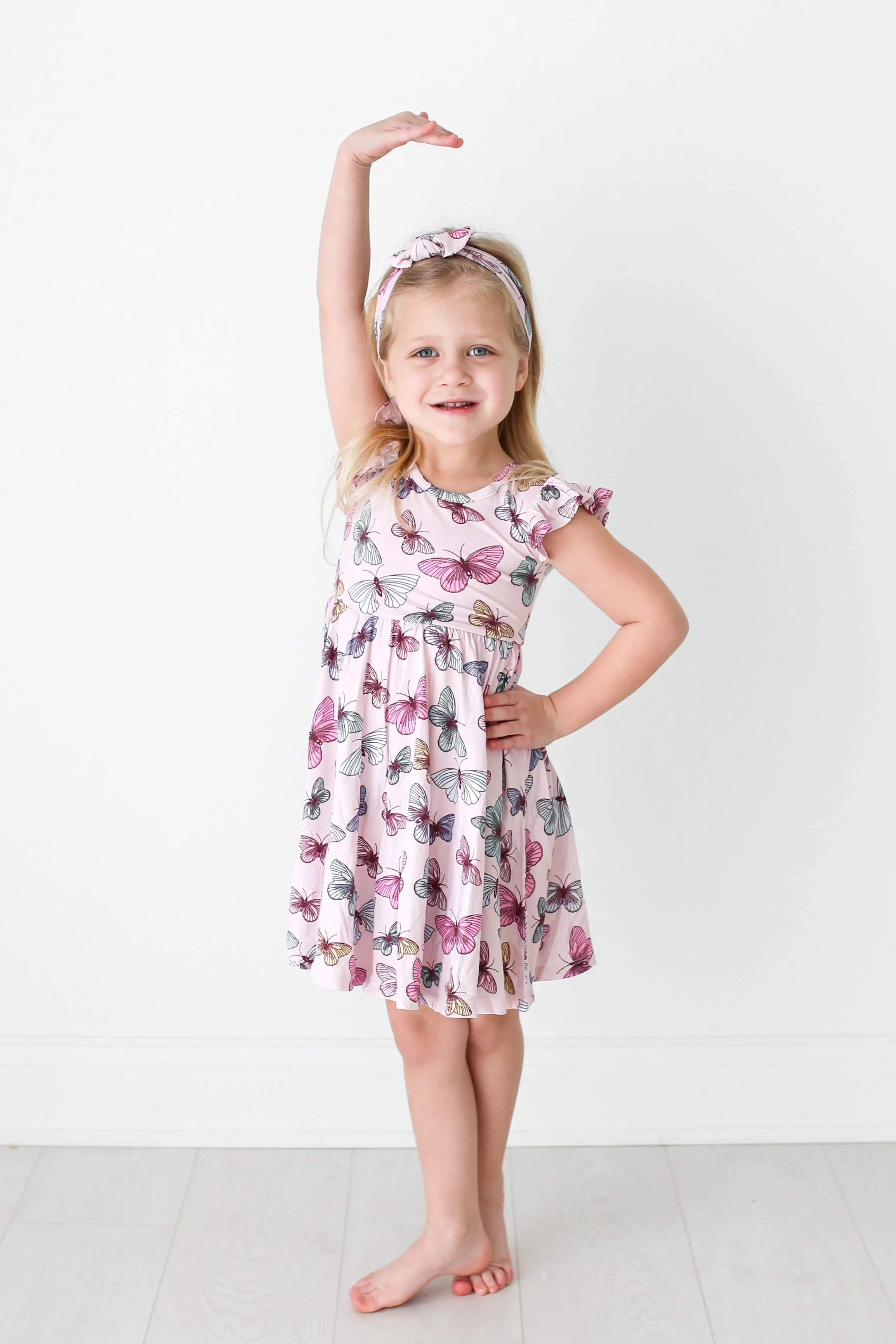 Posh Peanut Nora Ruffled Capsleeve Twirl Dress