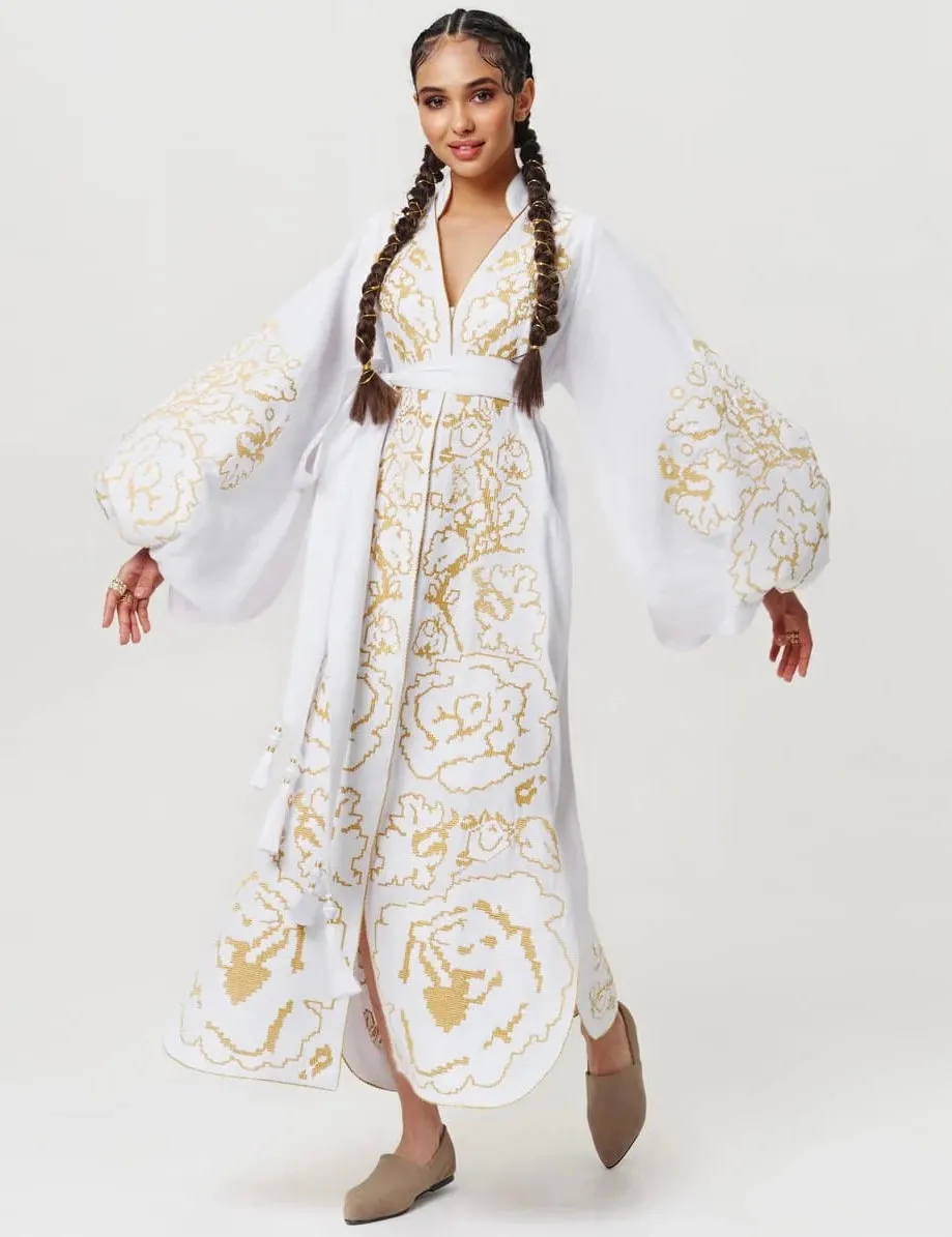 White kaftan with gold embroidery